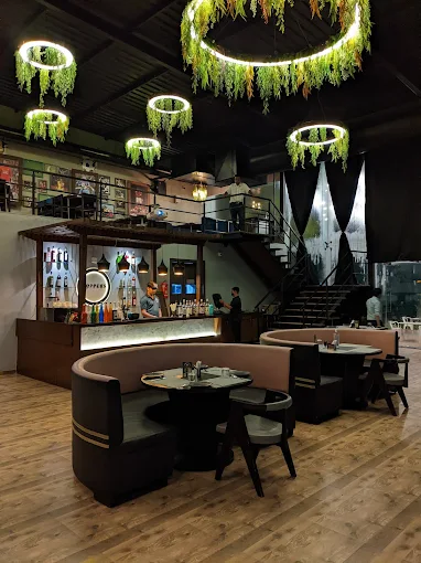 Hoppers indoor dining area with hanging greenery