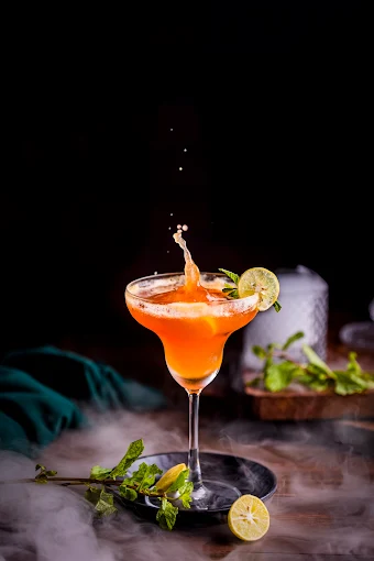 Orange mocktail with lime and mint