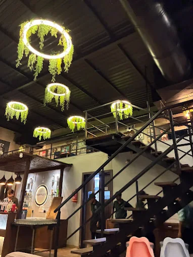 Hoppers staircase and hanging greenery lights